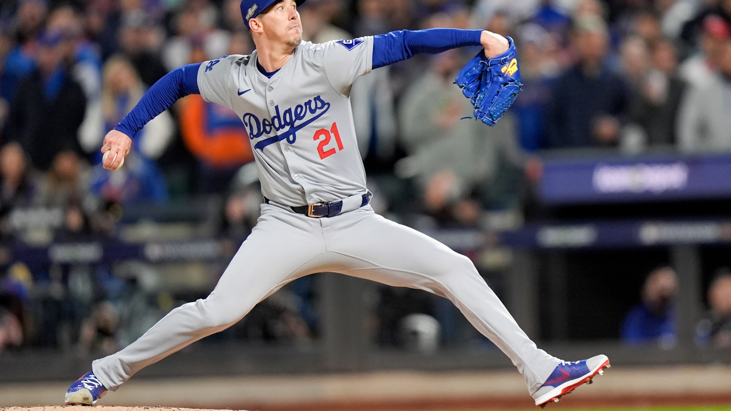 Los Angeles Dodgers pitcher Walker Buehler throws against the New York Mets during the first inning in Game 3 of a baseball NL Championship Series, Wednesday, Oct. 16, 2024, in New York. (AP Photo/Frank Franklin II)