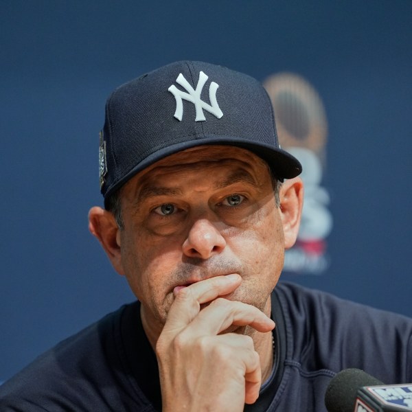 New York Yankees manager Aaron Boone listens to a question during a news conference before Game 2 of the baseball World Series, Saturday, Oct. 26, 2024, in Los Angeles. (AP Photo/Godofredo A. Vásquez)