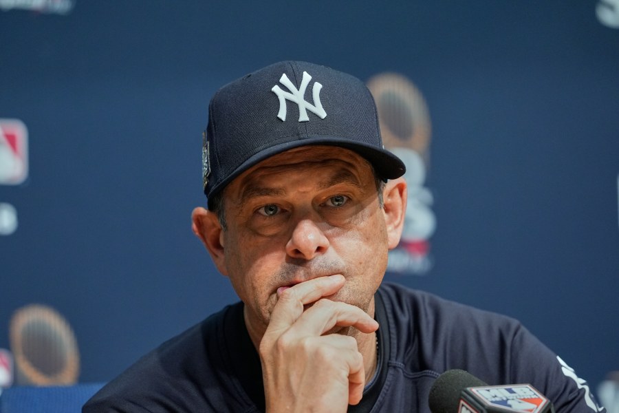 New York Yankees manager Aaron Boone listens to a question during a news conference before Game 2 of the baseball World Series, Saturday, Oct. 26, 2024, in Los Angeles. (AP Photo/Godofredo A. Vásquez)