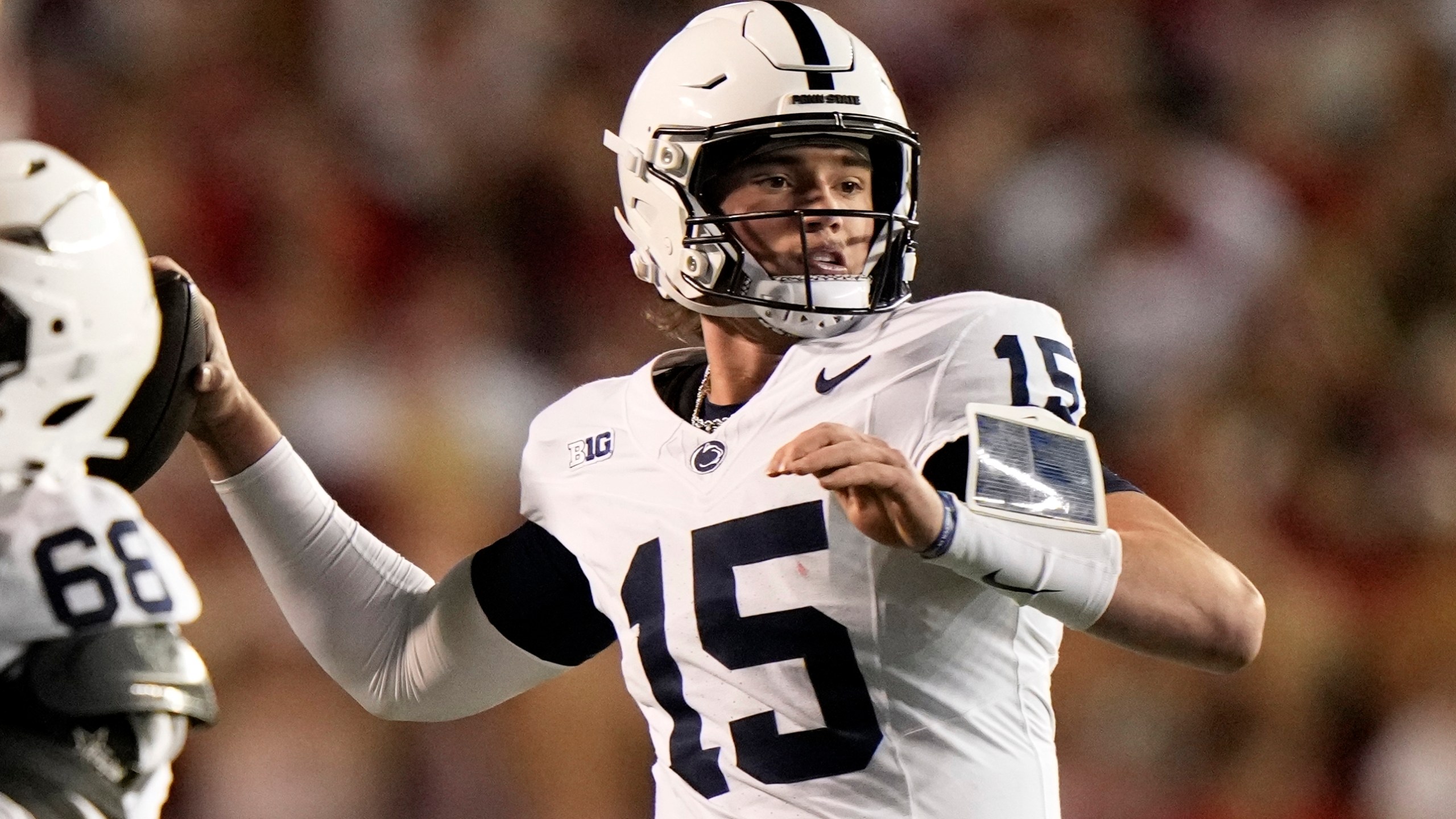 Penn State's Drew Allar (15) throws during the first half of an NCAA college football game against the WisconsinSaturday, Oct. 26, 2024, in Madison, Wis. (AP Photo/Morry Gash)