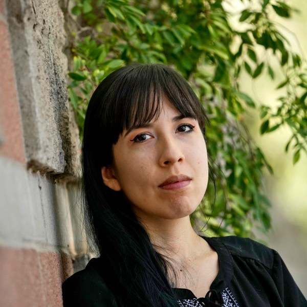 Jocelyn Ruiz, 26, pictured in Tempe, Ariz., Tuesday, Oct. 22, 2024, is a U.S. citizen who discovered a family secret that her mother could be deported at any time. (AP Photo/Matt York)