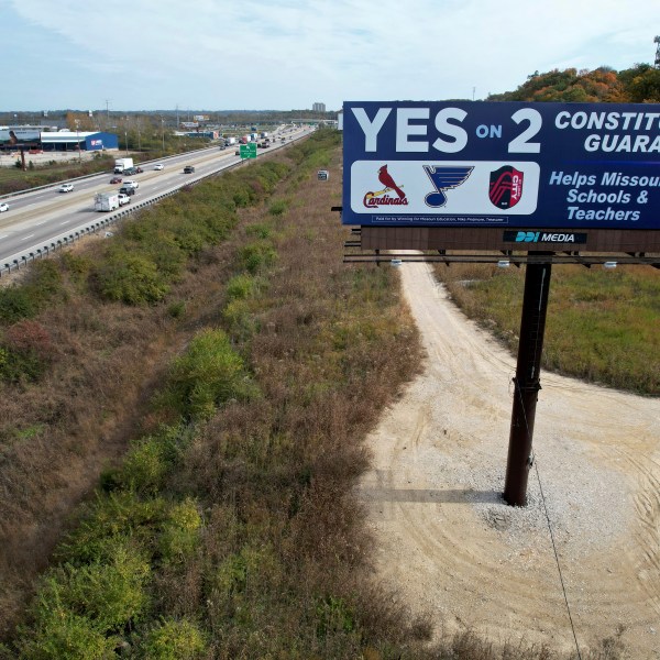 A billboard promoting a ballot measure to legalize sports betting in Missouri is seen along Interstate 44 Wednesday, Oct. 23, 2024, in St. Louis County, Mo. (AP Photo/Jeff Roberson)