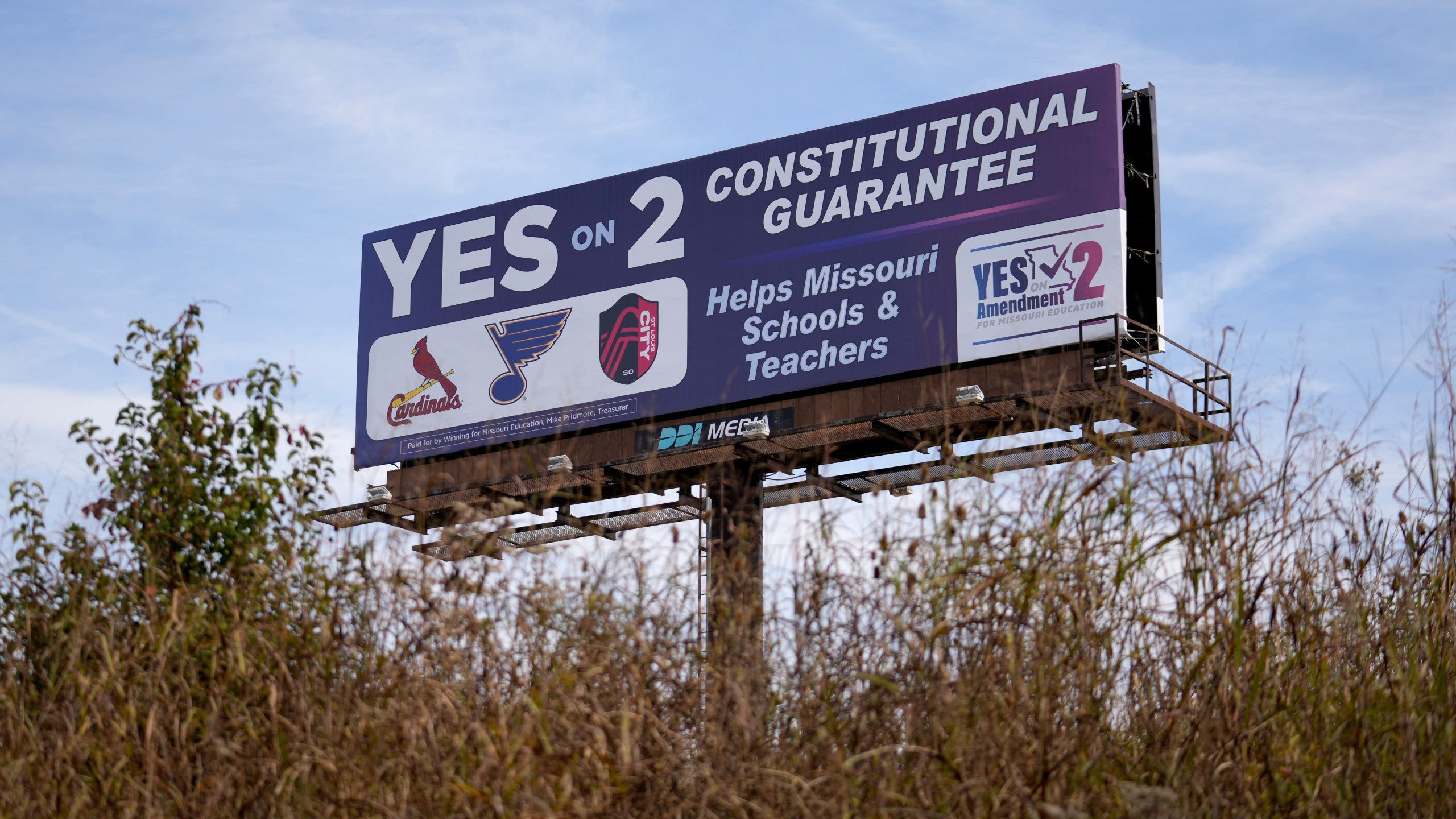 A billboard promoting a ballot measure to legalize sports betting in Missouri is seen along Interstate 44 Wednesday, Oct. 23, 2024, in St. Louis County, Mo. (AP Photo/Jeff Roberson)