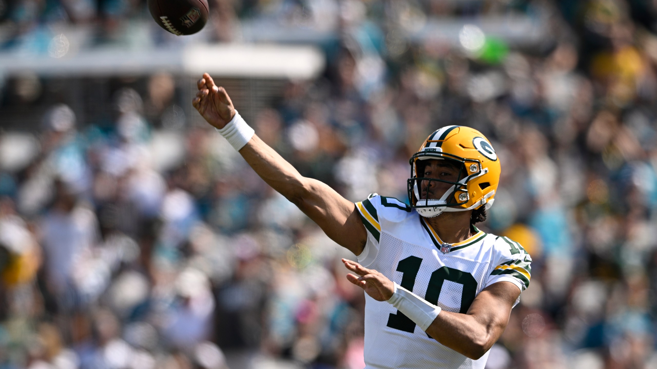 Green Bay Packers' Jordan Love throws during the first half of an NFL football game against the Jacksonville Jaguars Sunday, Oct. 27, 2024, in Jacksonville, Fla. (AP Photo/Phelan M. Ebenhack)