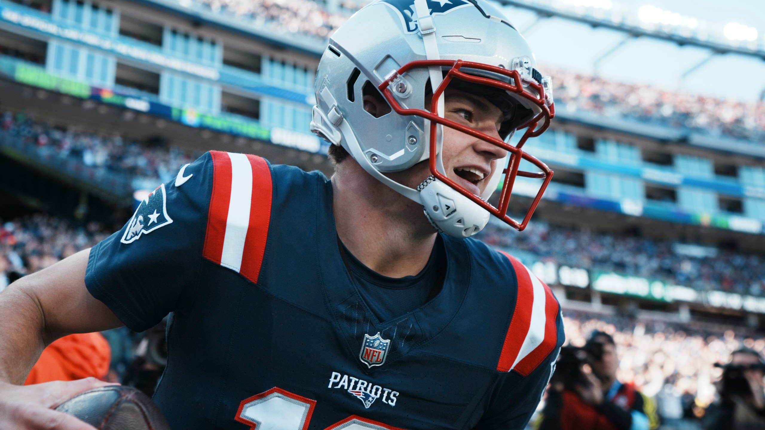 New England Patriots quarterback Drake Maye celebrates after running for a touchdown in the first half of an NFL football game against the New York Jets, Sunday, Oct. 27, 2024, in Foxborough, Mass. (AP Photo/Michael Dwyer)