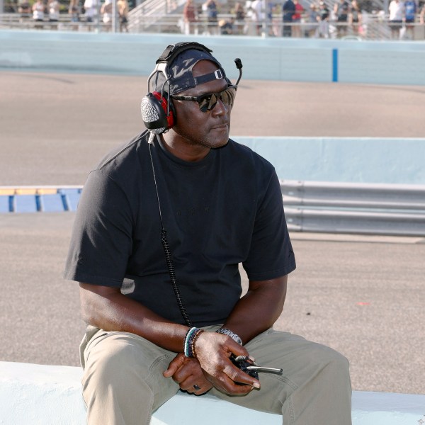 Car owner Michael Jordan watches from the pits during a NASCAR Cup Series auto race at Homestead-Miami Speedway in Homestead, Fla., Sunday, Oct. 27, 2024. (AP Photo/Terry Renna)