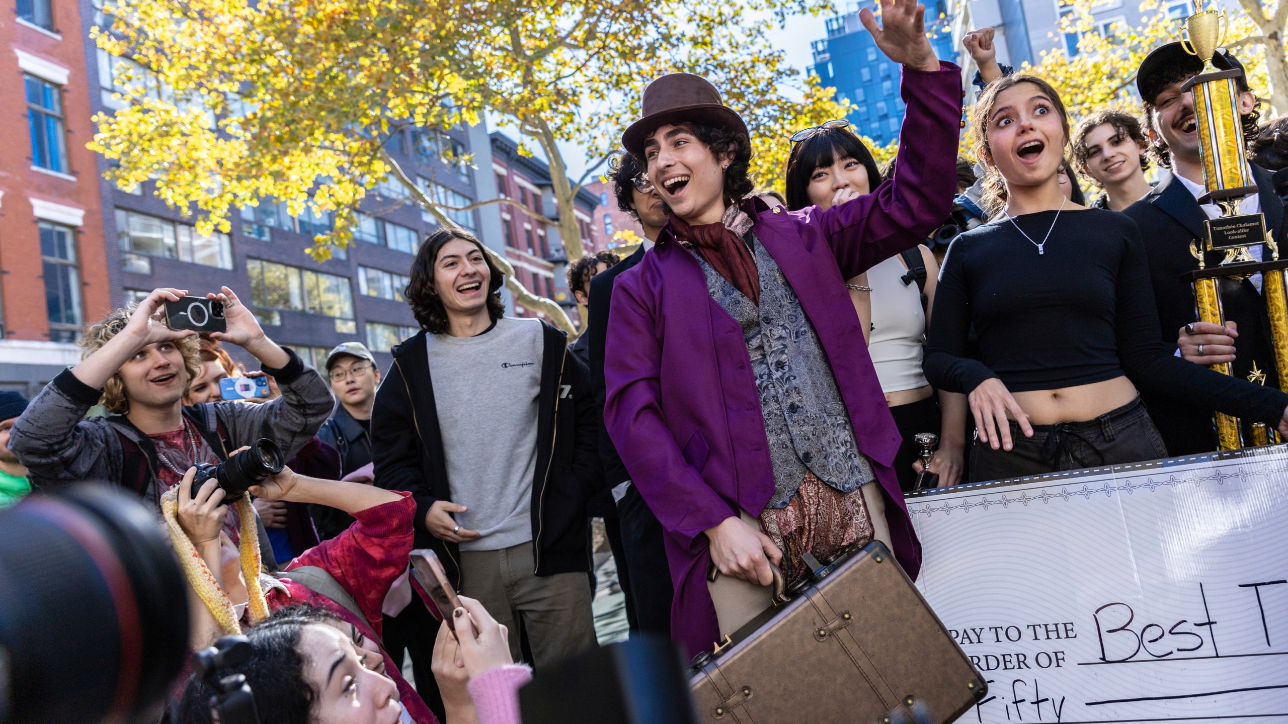 Miles Mitchell, 21, winner of the Timothee Chalamet lookalike contest near Washington Square Park, Sunday, Oct. 27, 2024, in New York. (AP Photo/Stefan Jeremiah)