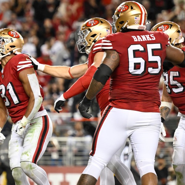 San Francisco 49ers running back Isaac Guerendo (31) celebrates after scoring against the Dallas Cowboys during the second half of an NFL football game in Santa Clara, Calif., Sunday, Oct. 27, 2024. (AP Photo/Eakin Howard)