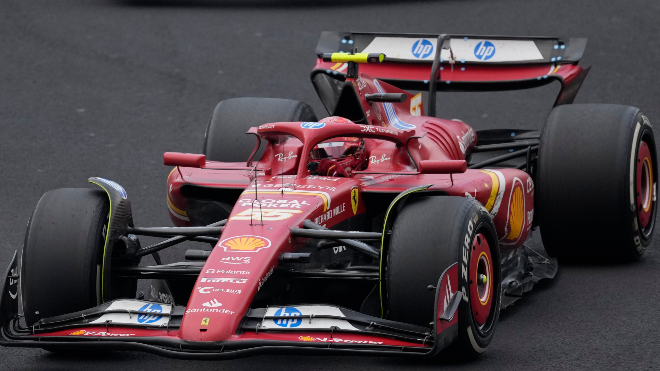 Carlos Sainz, of Spain, steers his Ferrari during the Formula One Mexico Grand Prix auto race at the Hermanos Rodriguez racetrack in Mexico City, Sunday, Oct. 27, 2024. (AP Photo/Eduardo Verdugo)