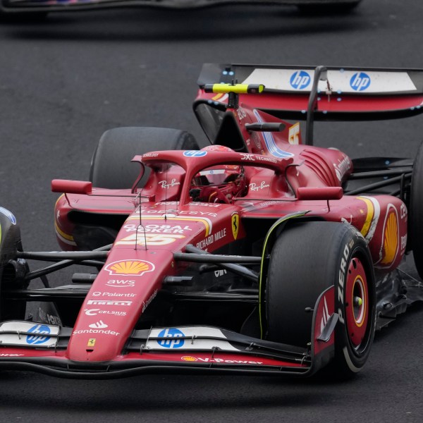 Carlos Sainz, of Spain, steers his Ferrari during the Formula One Mexico Grand Prix auto race at the Hermanos Rodriguez racetrack in Mexico City, Sunday, Oct. 27, 2024. (AP Photo/Eduardo Verdugo)