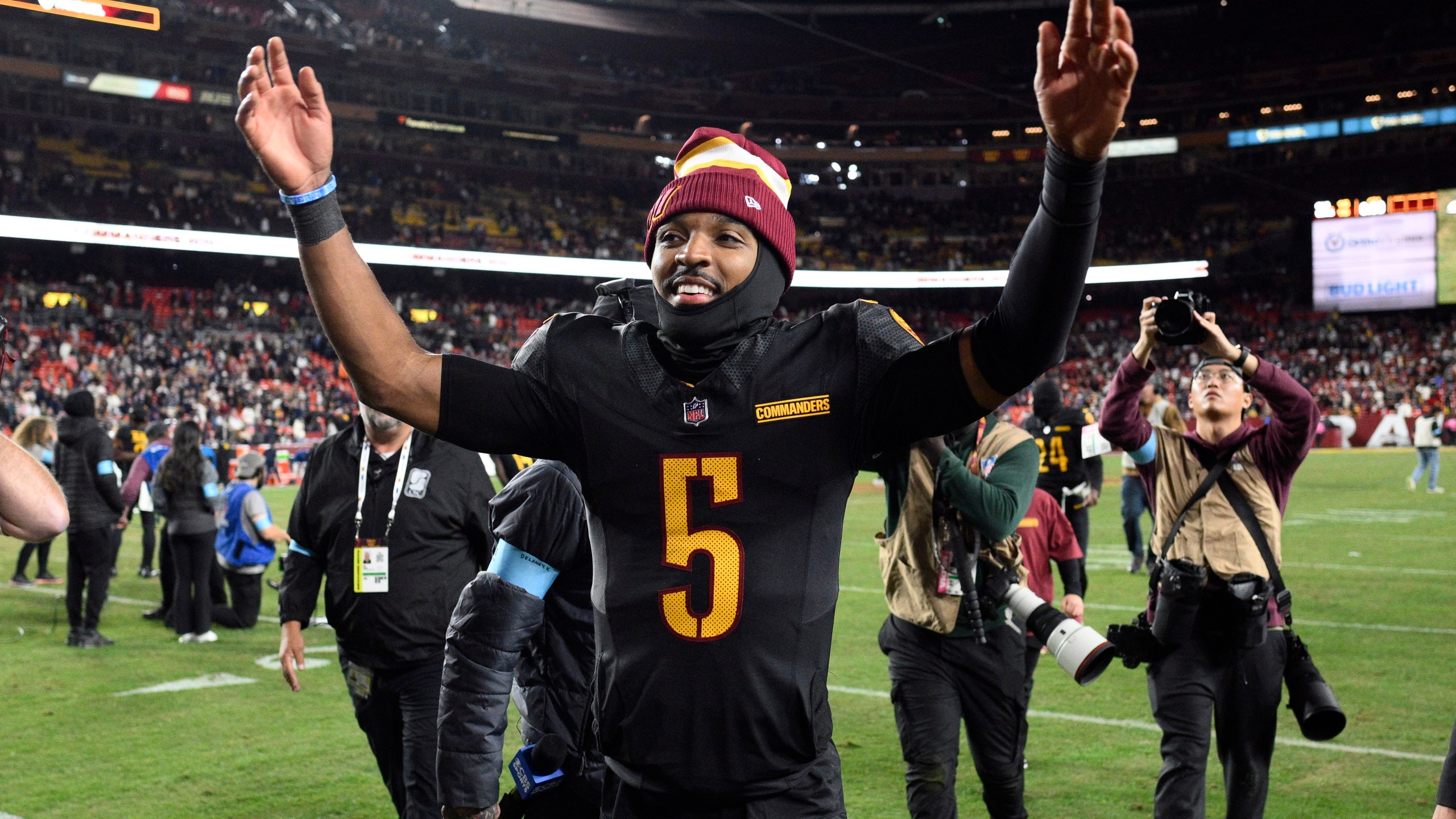 Washington Commanders quarterback Jayden Daniels (5) leaves the field after an 18-15 win over the Chicago Bears in an NFL football game Sunday, Oct. 27, 2024, in Landover, Md. (AP Photo/Nick Wass)