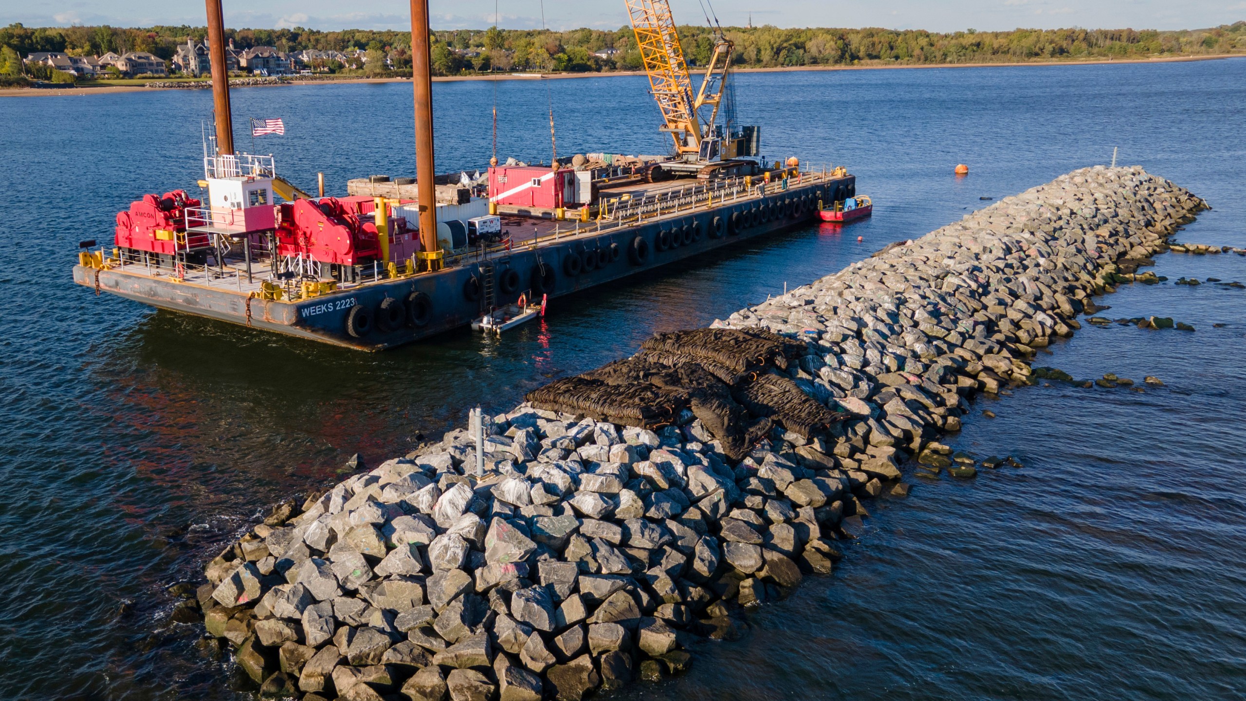 Construction is wrapping up on eight eco-friendly "Living Breakwaters" at the southernmost tip of New York City, off the coast of Staten Island, Wednesday, Oct. 9, 2024. (AP Photo/Ted Shaffrey)