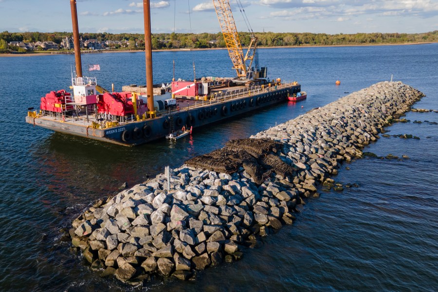 Construction is wrapping up on eight eco-friendly "Living Breakwaters" at the southernmost tip of New York City, off the coast of Staten Island, Wednesday, Oct. 9, 2024. (AP Photo/Ted Shaffrey)