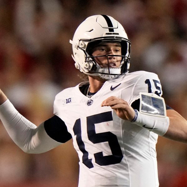 Penn State's Drew Allar (15) throws during the first half of an NCAA college football game against the WisconsinSaturday, Oct. 26, 2024, in Madison, Wis. (AP Photo/Morry Gash)