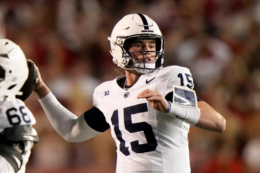 Penn State's Drew Allar (15) throws during the first half of an NCAA college football game against the WisconsinSaturday, Oct. 26, 2024, in Madison, Wis. (AP Photo/Morry Gash)