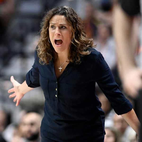 Connecticut Sun head coach Stephanie White reacts during the first half of a WNBA basketball semifinal game against the Minnesota Lynx, Friday, Oct. 4, 2024, in Uncasville, Conn. (AP Photo/Jessica Hill)