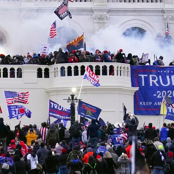 FILE - Rioters storm the West Front of the U.S. Capitol Jan. 6, 2021, in Washington. (AP Photo/John Minchillo, File)