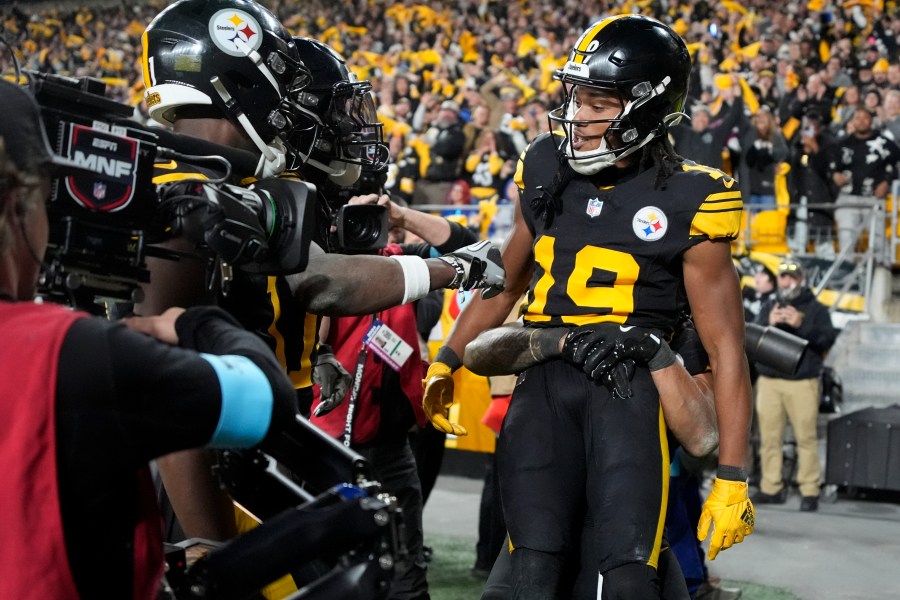 Pittsburgh Steelers wide receiver Calvin Austin III (19) celebrates his touchdown catch with teammates during the second half of an NFL football game against the New York Giants, Monday, Oct. 28, 2024, in Pittsburgh. (AP Photo/Gene J. Puskar)