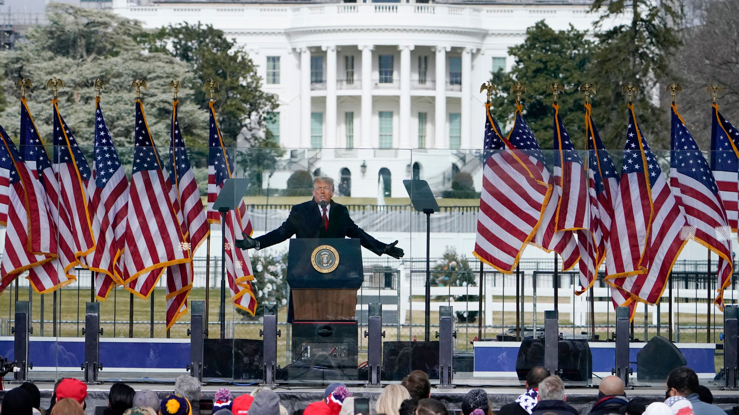 FILE - With the White House in the background, President Donald Trump speaks at a rally in Washington, Jan. 6, 2021. (AP Photo/Jacquelyn Martin, File)