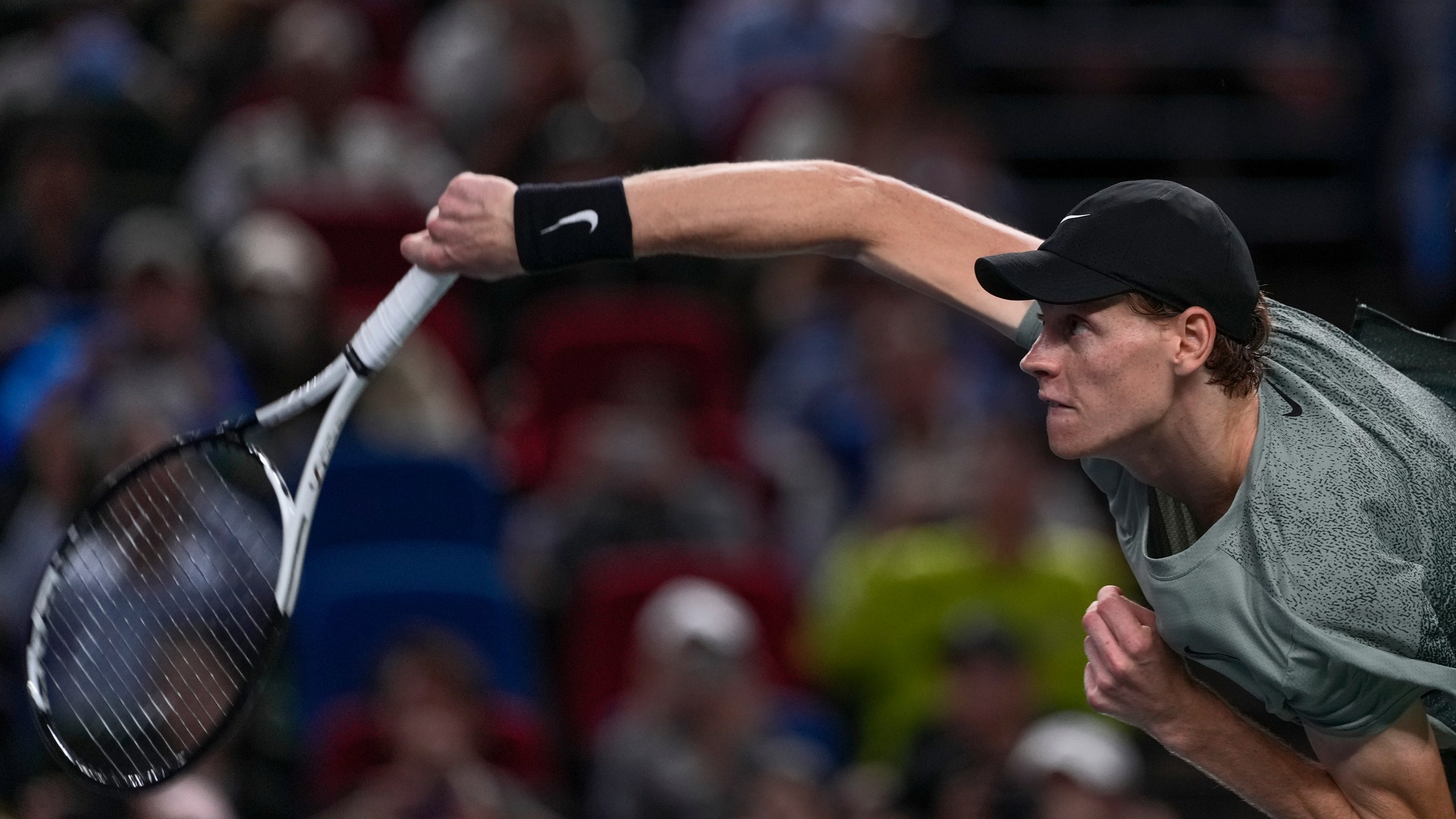 Jannik Sinner of Italy serves his winning shot against Novak Djokovic of Serbia during the men's singles match in the Shanghai Masters tennis tournament at Qizhong Forest Sports City Tennis Center in Shanghai, China, Sunday, Oct. 13, 2024. (AP Photo/Andy Wong)