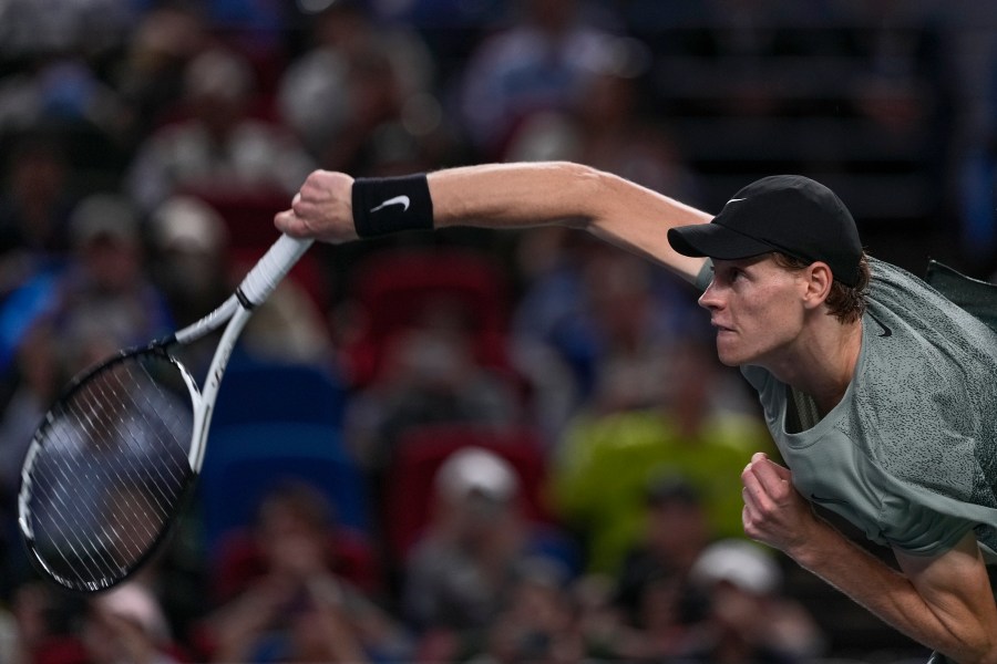 Jannik Sinner of Italy serves his winning shot against Novak Djokovic of Serbia during the men's singles match in the Shanghai Masters tennis tournament at Qizhong Forest Sports City Tennis Center in Shanghai, China, Sunday, Oct. 13, 2024. (AP Photo/Andy Wong)