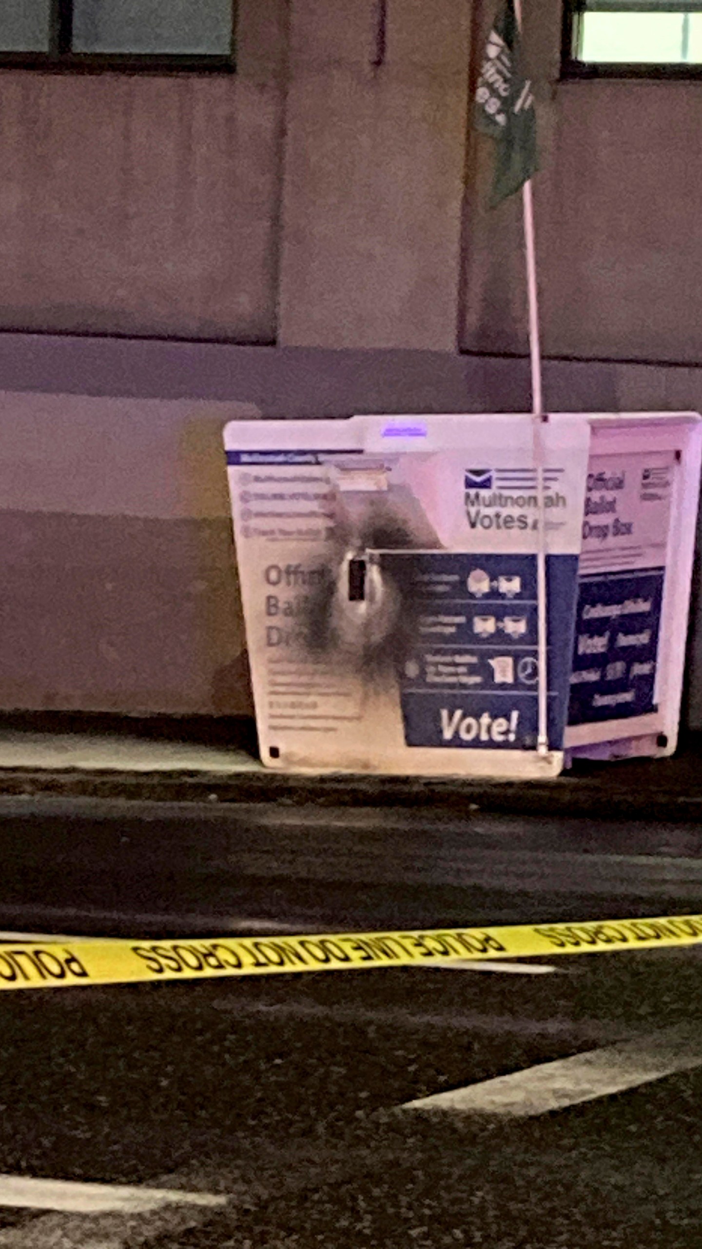 This image released by the Portland Police Bureau shows a ballot box after an incendiary device was discovered inside, in Portland, Ore., Monday, Oct. 28, 2024. (Portland Police Bureau via AP)