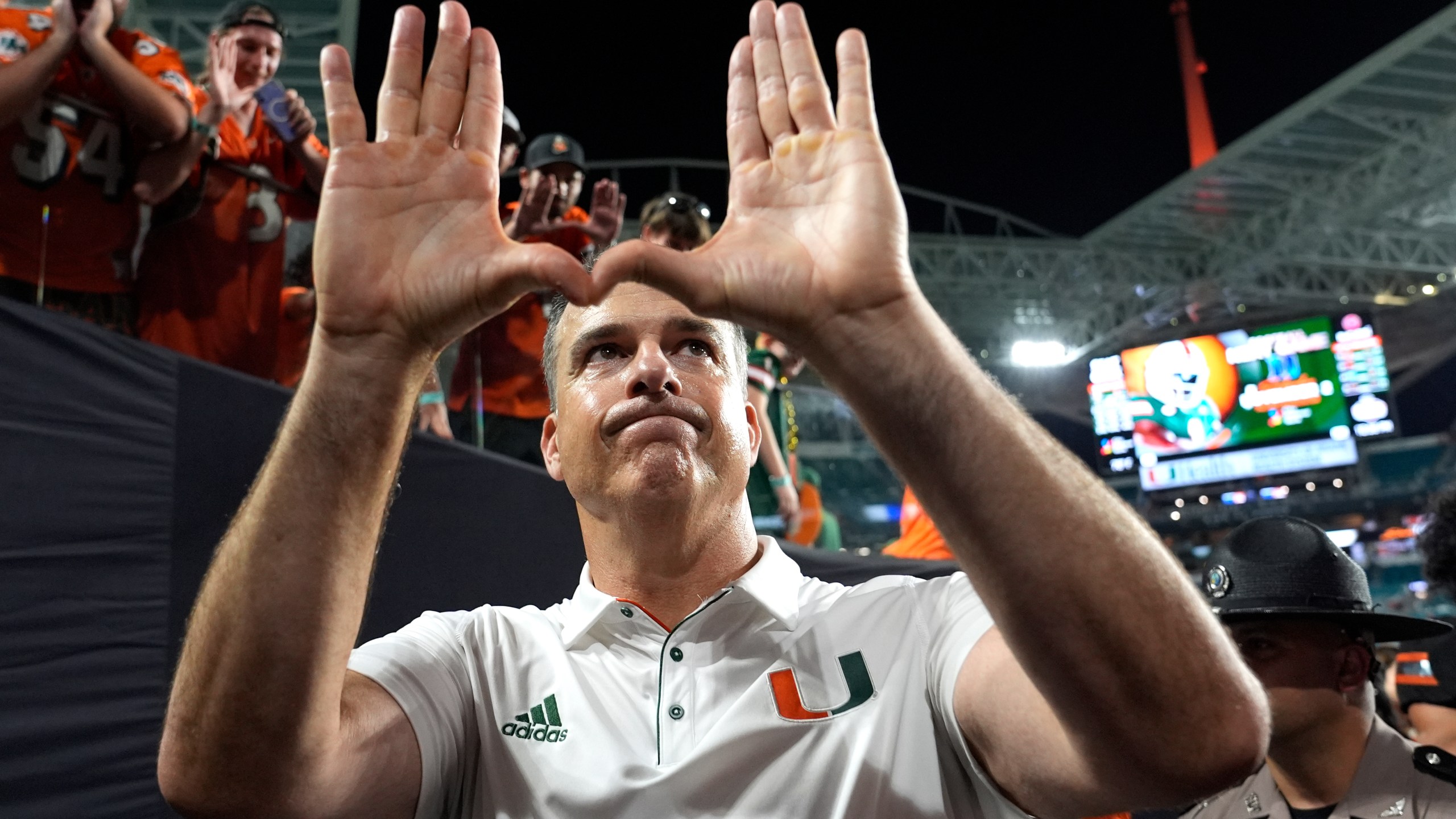 Miami head coach Mario Cristobal acknowledges the crowd after an NCAA college football game against Florida State, Saturday, Oct. 26, 2024, in Miami Gardens, Fla. (AP Photo/Lynne Sladky)