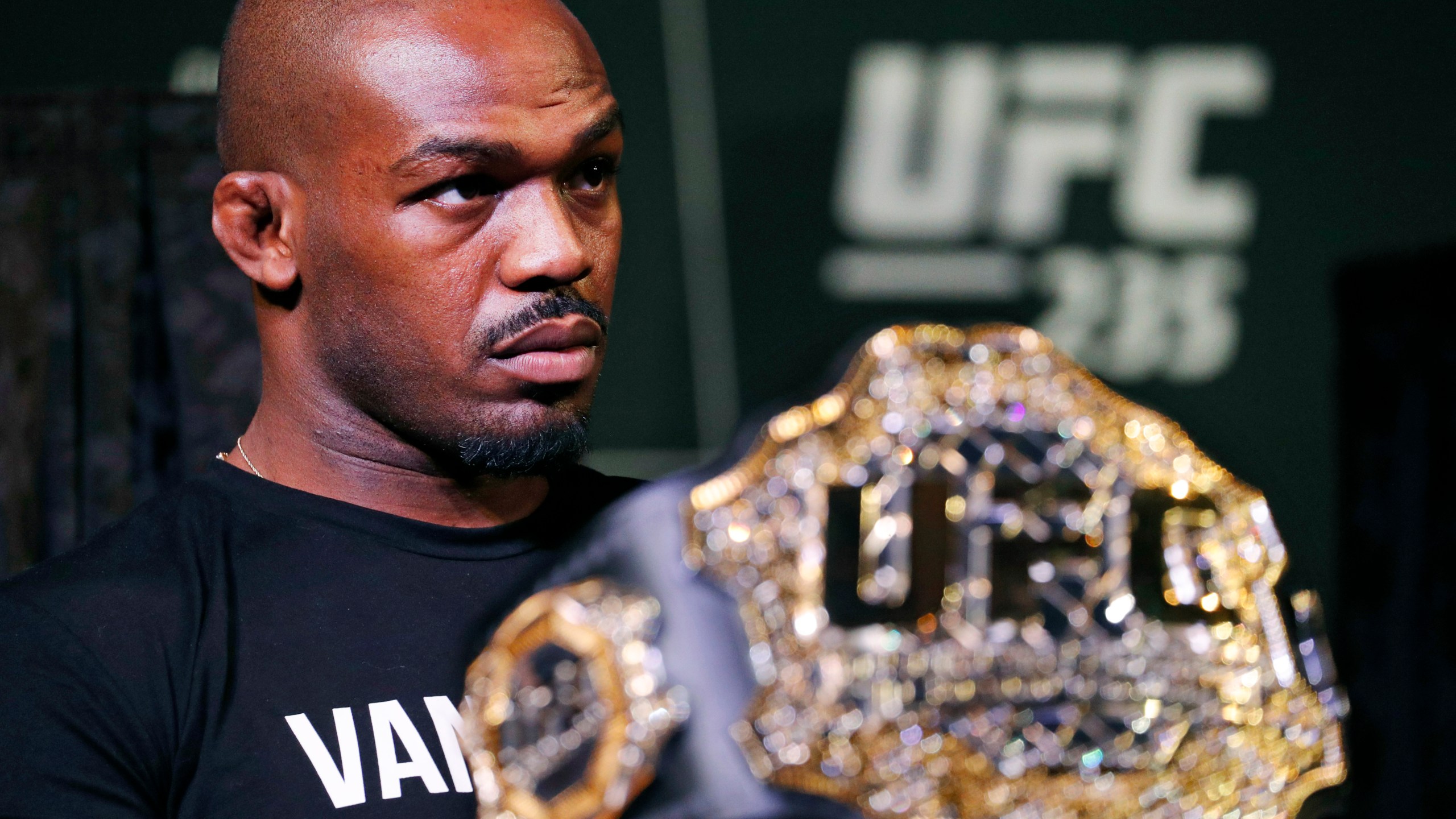 FILE - In this Jan. 31, 2019, file photo, light heavyweight champion Jon Jones attends a news conference for the UFC 235 mixed martial arts event in Las Vegas. (AP Photo/John Locher, File)