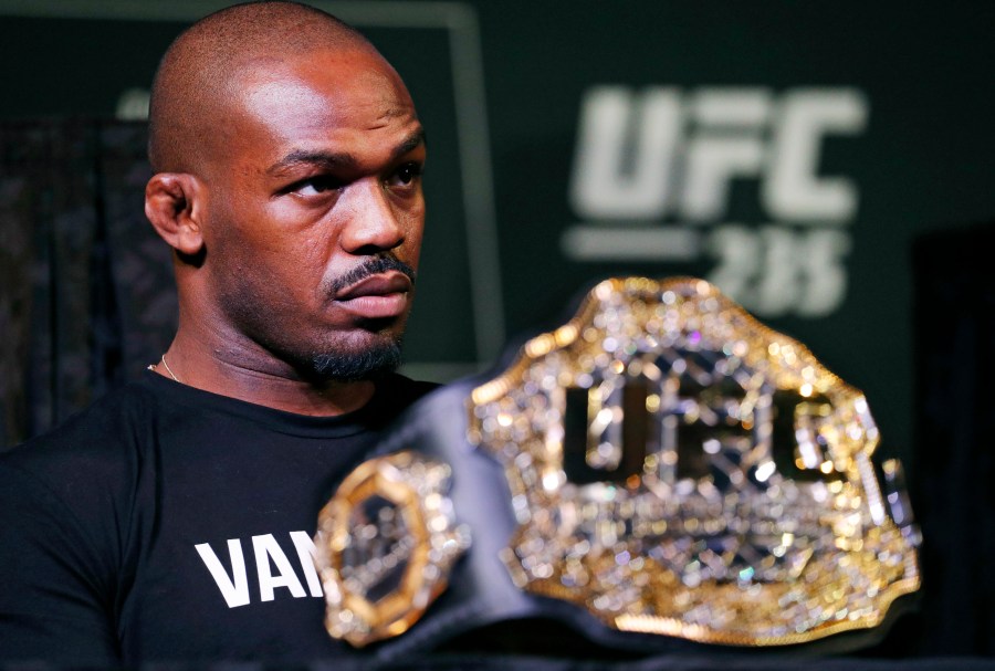 FILE - In this Jan. 31, 2019, file photo, light heavyweight champion Jon Jones attends a news conference for the UFC 235 mixed martial arts event in Las Vegas. (AP Photo/John Locher, File)