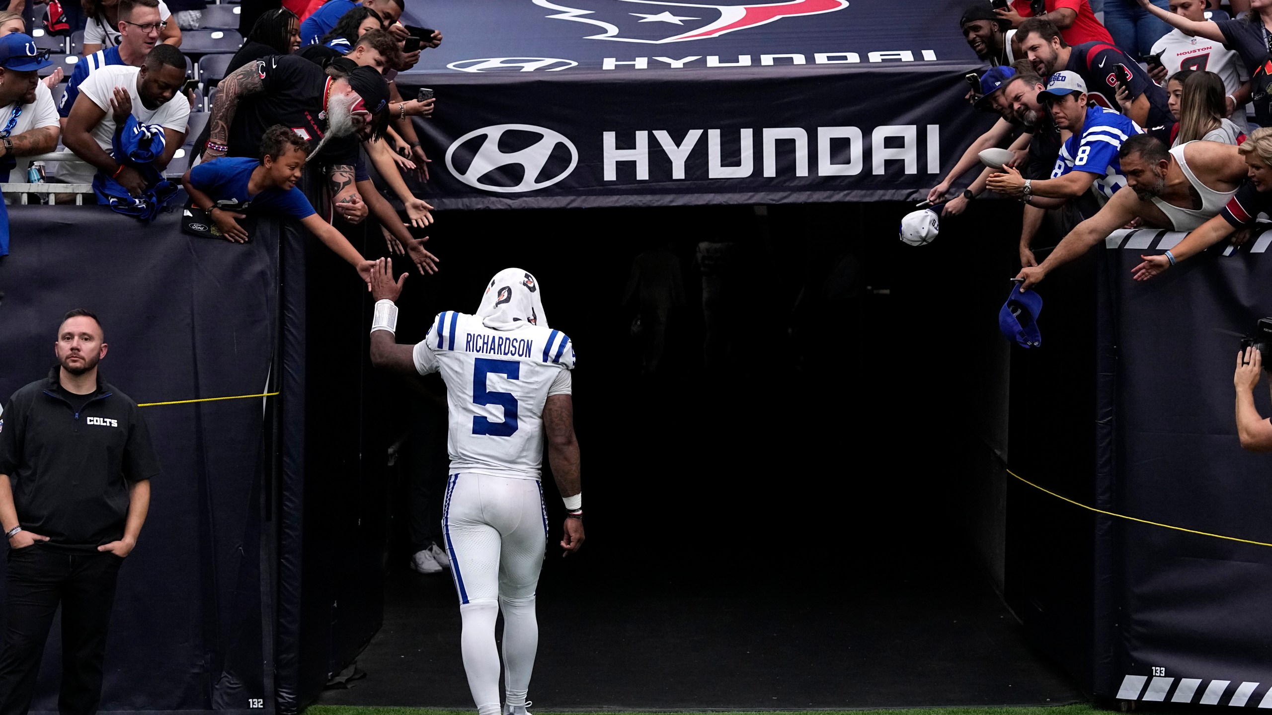 Indianapolis Colts quarterback Anthony Richardson walks off the field after an NFL football game against the Houston Texans, Sunday, Oct. 27, 2024, in Houston. The Texans won 23-20. (AP Photo/Tony Gutierrez)