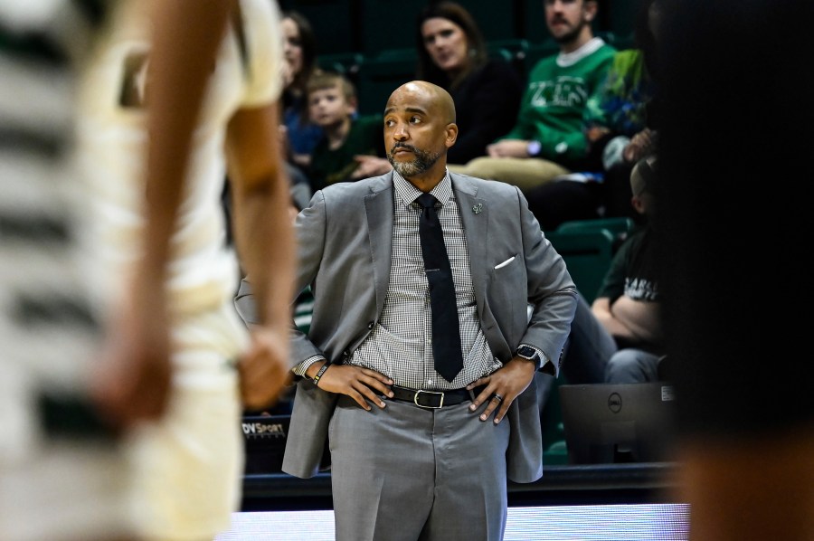 FILE - South Florida head coach Amir Abdur-Rahim looks on during the first half of an NCAA college basketball game against Charlotte, March 2, 2024, in Charlotte, N.C. (AP Photo/Matt Kelley, File)