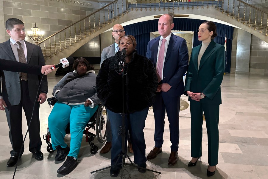 FILE - Oriel Moore describes her life without her brother, Othel Moore Jr., to reporters Dec. 19, 2023, at the Missouri Capitol in Jefferson City, Mo. (AP Photo/Summer Ballentine, File)