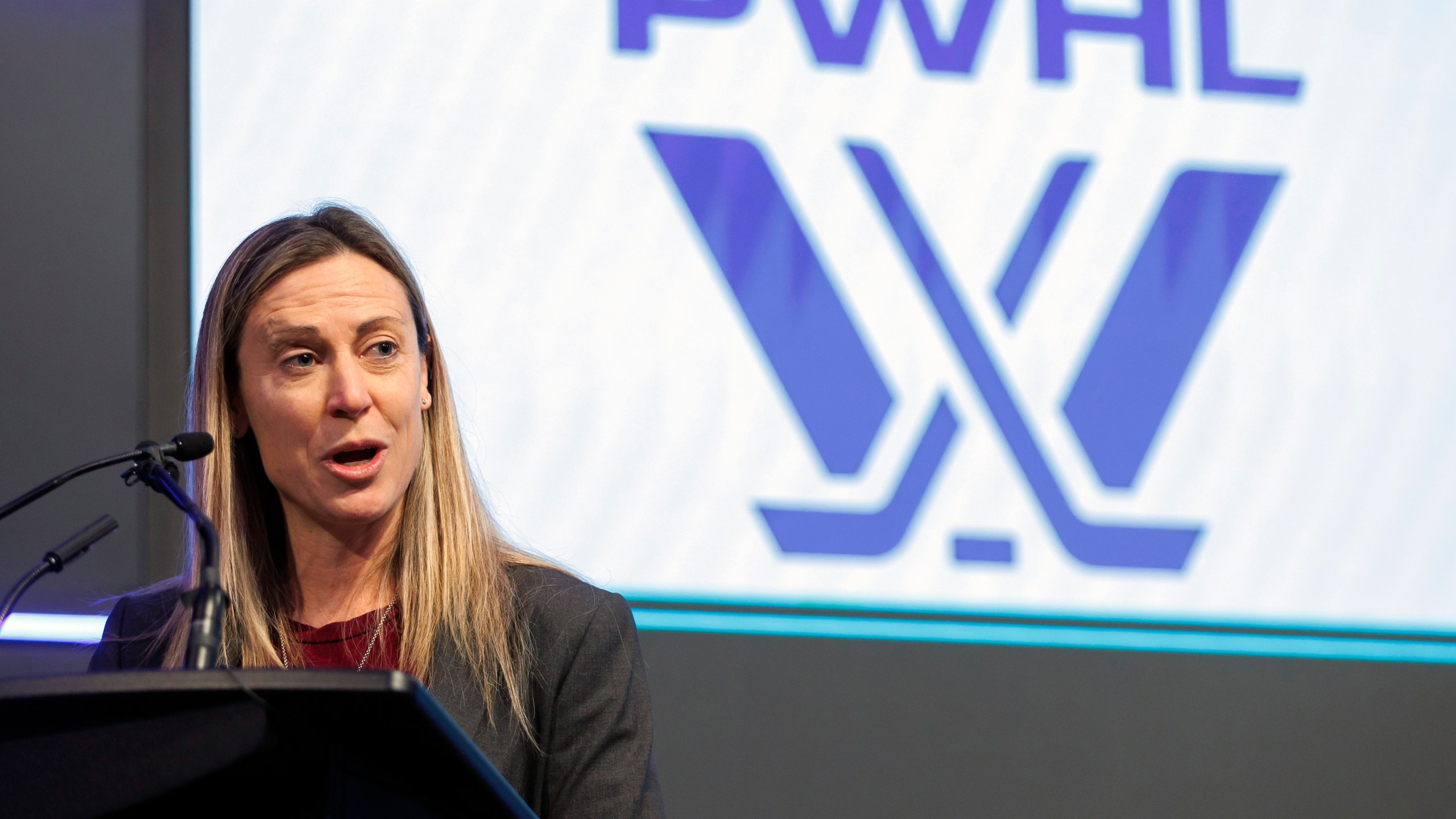 FILE - Professional Women's Hockey League senior vice president of hockey operations Jayna Hefford speaks before the PWHL Toronto team opened the Toronto Stock Exchange in Toronto, Jan. 12, 2024. (Cole Burston/The Canadian Press via AP, File)