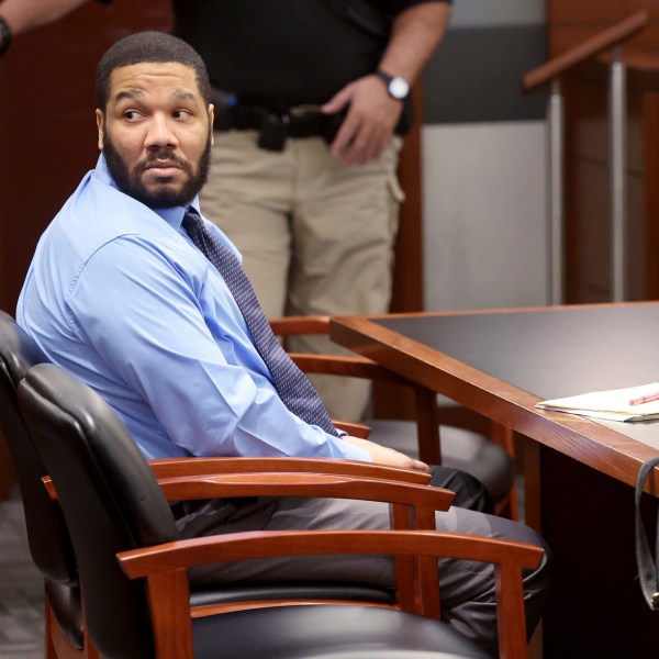 Defendant Julius Trotter, a previously convicted felon who is charged with breaking into a room at a Las Vegas Strip hotel-casino and robbing and killing two Vietnamese tour leaders in June 2018, waits in the courtroom for the verdict in his murder trial, Tuesday, Oct. 29, 2024, at the Regional Justice Center in Las Vegas. (K.M. Cannon/Las Vegas Review-Journal via AP)