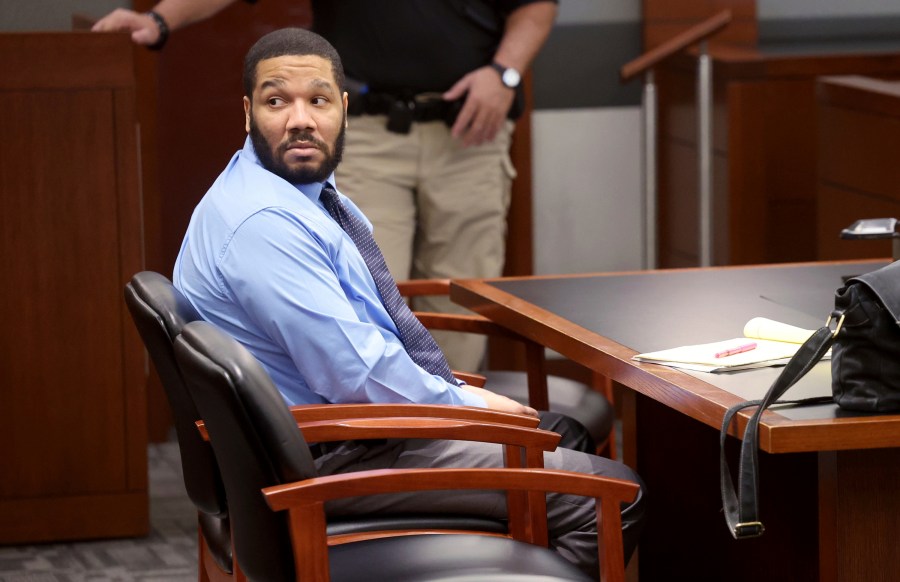 Defendant Julius Trotter, a previously convicted felon who is charged with breaking into a room at a Las Vegas Strip hotel-casino and robbing and killing two Vietnamese tour leaders in June 2018, waits in the courtroom for the verdict in his murder trial, Tuesday, Oct. 29, 2024, at the Regional Justice Center in Las Vegas. (K.M. Cannon/Las Vegas Review-Journal via AP)