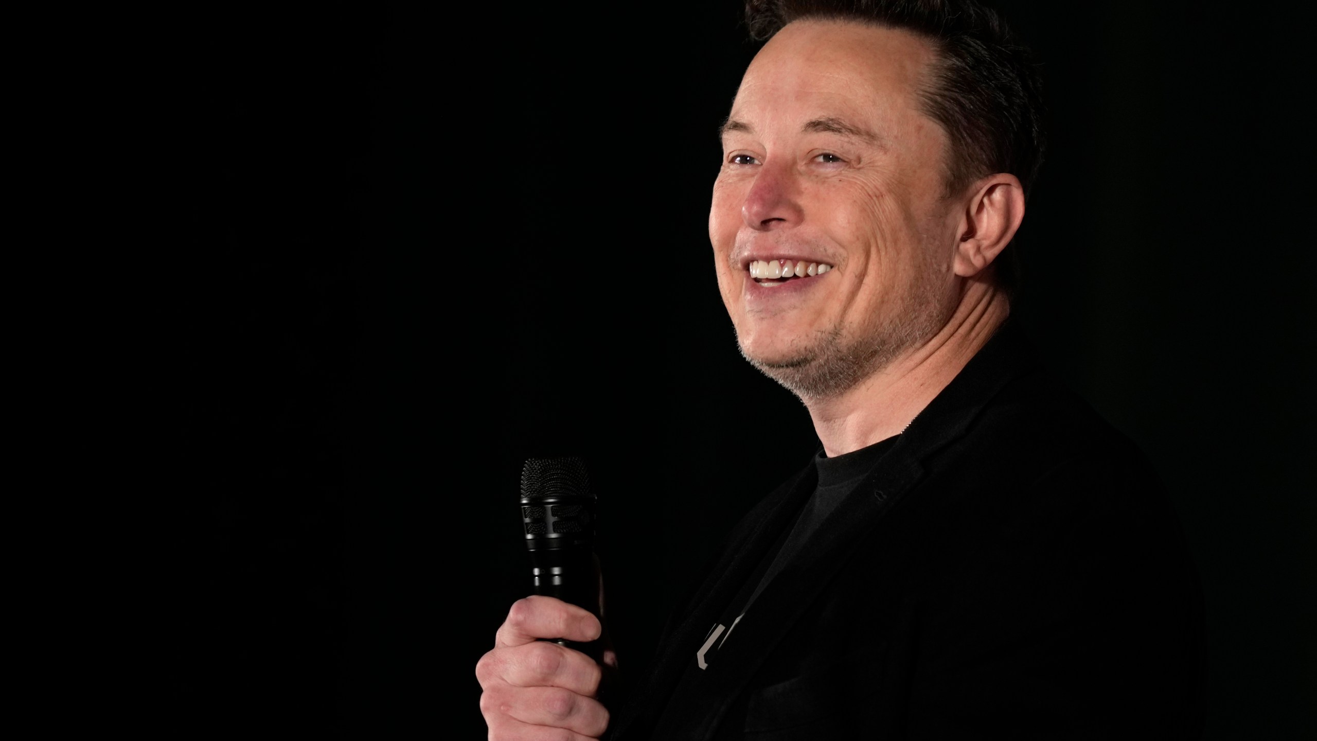 Elon Musk speaks as part of a campaign town hall in support of Republican presidential nominee former President Donald Trump in Folsom, Pa., Thursday, Oct. 17, 2024. (AP Photo/Matt Rourke)