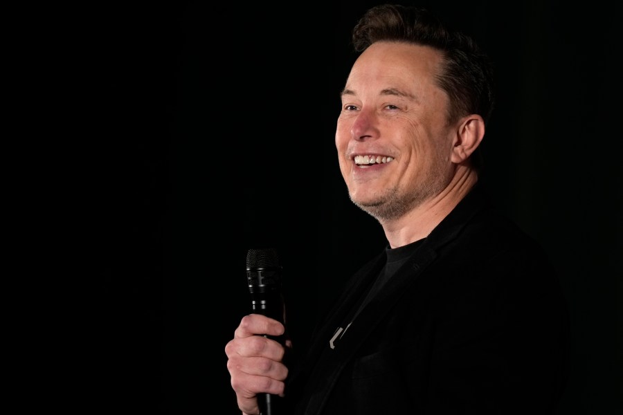 Elon Musk speaks as part of a campaign town hall in support of Republican presidential nominee former President Donald Trump in Folsom, Pa., Thursday, Oct. 17, 2024. (AP Photo/Matt Rourke)