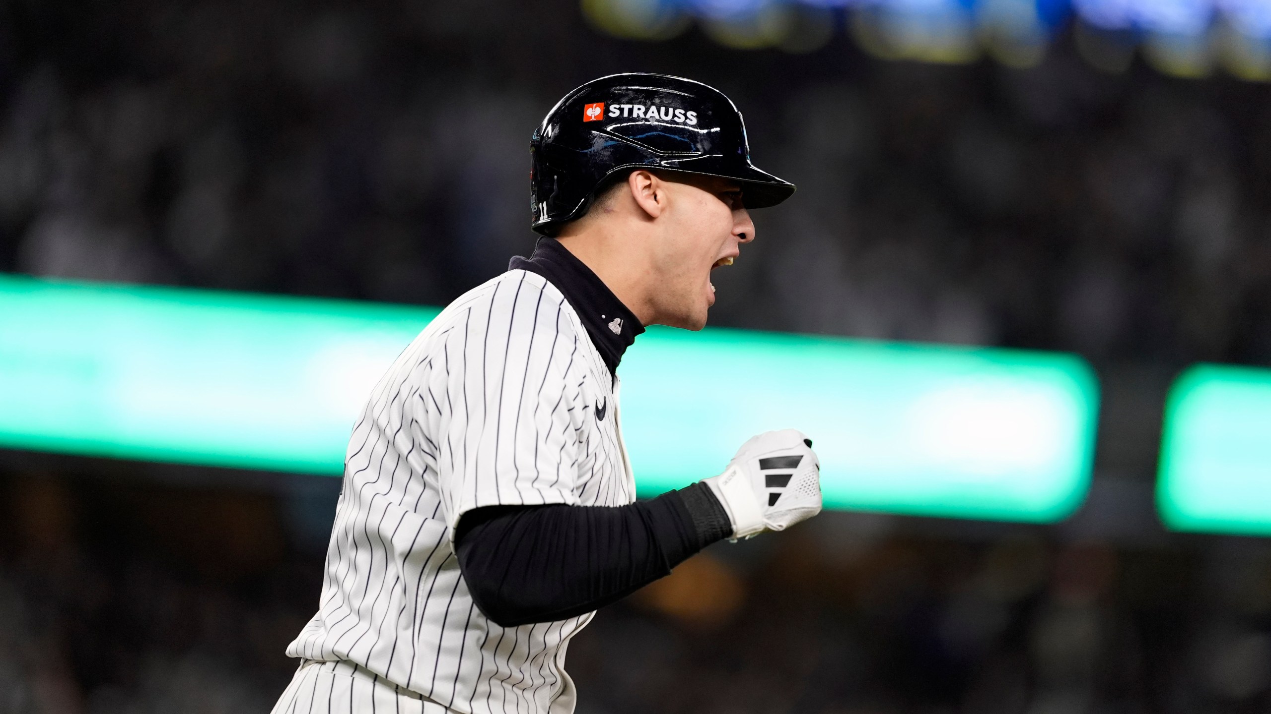 New York Yankees' Anthony Volpe celebrates after hitting a grand slam against the Los Angeles Dodgers during the third inning in Game 4 of the baseball World Series, Tuesday, Oct. 29, 2024, in New York. (AP Photo/Godofredo A. Vásquez)