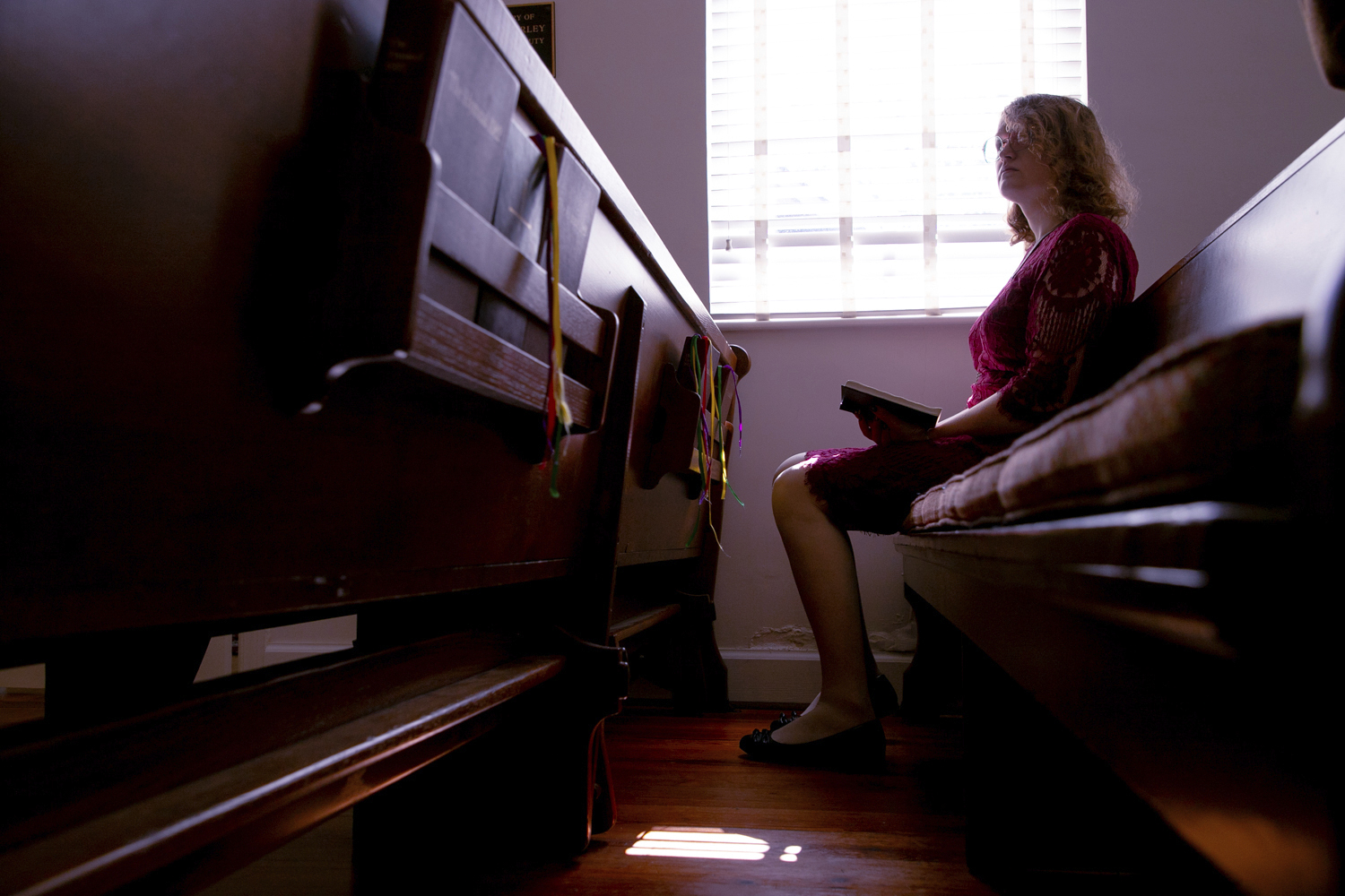 In this photo provided by the ACLU of Virginia, Ellenor Zinski attends church at Trinity Episcopal Church in Lynchburg, Va., on Oct. 6, 2024. (Phuong Tran/ACLU of Virginia via AP)