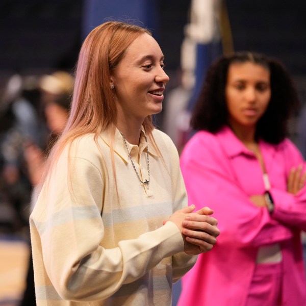 UConn basketball player Paige Bueckers talks to reporters during the Big East NCAA college basketball media day in New York, Wednesday, Oct. 23, 2024. (AP Photo/Seth Wenig)