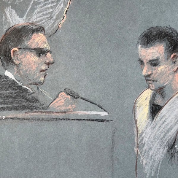 FILE - This artist depiction shows Massachusetts Air National Guardsman Jack Teixeira, right, appearing in U.S. District Court in Boston, April 14, 2023. (Margaret Small via AP, File)