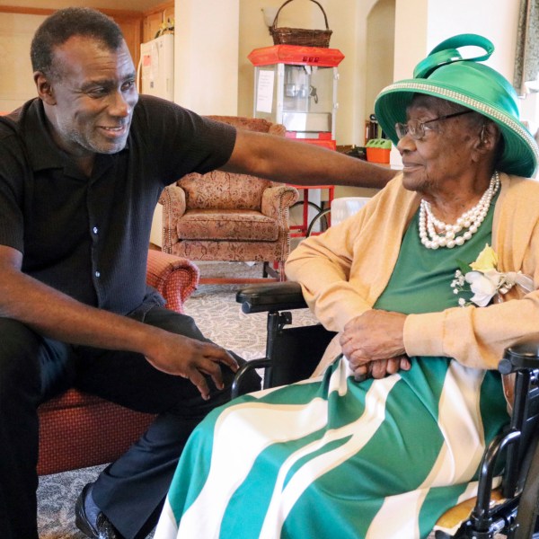 Dan Whitehead chats with his grandmother, Naomi Whitehead, at St. Paul's Senior Living Community in West Salem Township, Pa., in Sept. 2023. (Michael Roknick/The Herald via AP)