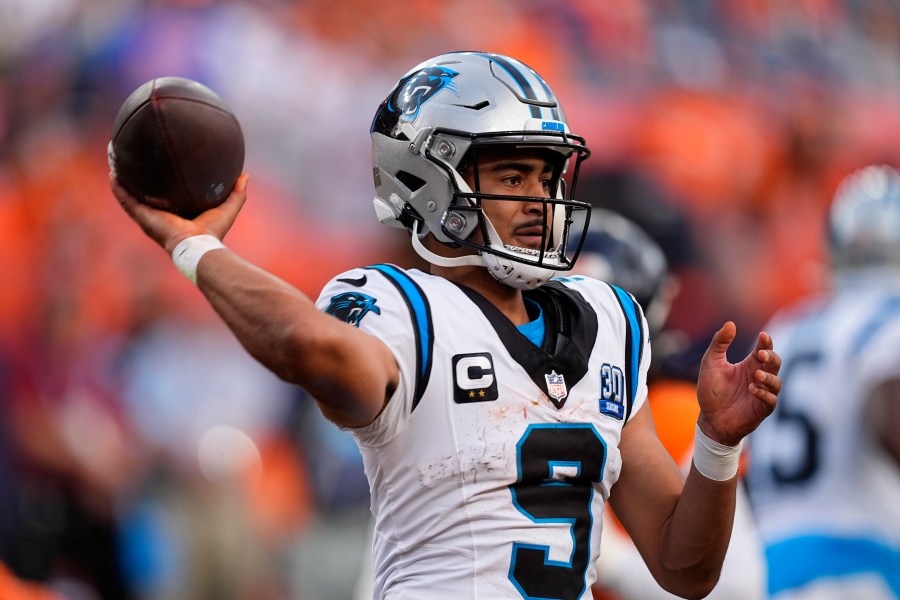 Carolina Panthers quarterback Bryce Young looks to throw a pass late in the second half of an NFL football game against the Denver Broncos, Sunday, Oct. 27, 2024, in Denver. (AP Photo/David Zalubowski)