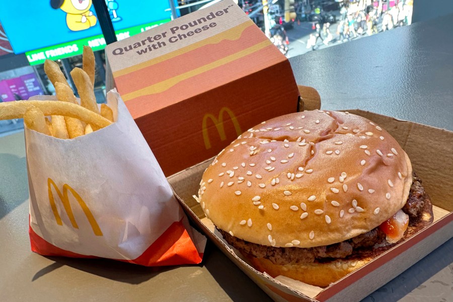 A McDonald's Quarter Pounder hamburger and fries are shown in this photograph, in New York's Times Square, Wednesday, Oct. 23, 2024. (AP Photo/Richard Drew)