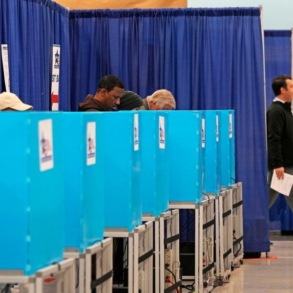 Voters cast ballots at the Chicago Early Voting Loop Supersite in Chicago, Oct. 24, 2024. (AP Photo/Nam Y. Huh)