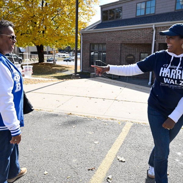 Linda Chapman of Waterbury, left, a member of the Zeta Phi Beta, talks with U.S. Rep. Jahana Hayes, D-Conn. at a Souls to the Polls voting rally at Grace Baptist Church Saturday, Oct. 26, 2024, in Waterbury, Conn. (AP Photo/Jessica Hill)