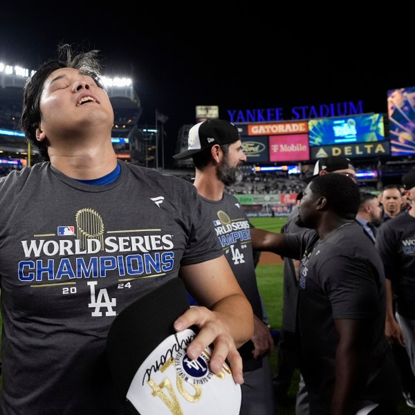 Los Angeles Dodgers' Shohei Ohtani celebrates after the Dodgers beat the New York Yankees in Game 5 to win the baseball World Series, Wednesday, Oct. 30, 2024, in New York. (AP Photo/Godofredo A. Vásquez)