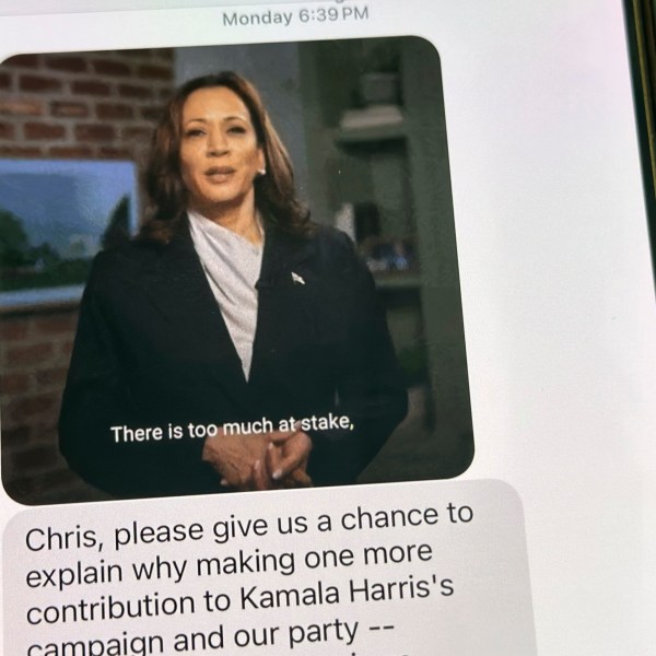 A text is viewed on a mobile device Wednesday, Oct. 30, 2024, in Washington, as across the U.S., people's phones are pinging with text messages from Donald Trump, Kamala Harris and their allies in the presidential campaign's final days. (AP Photo/Jon Elswick)