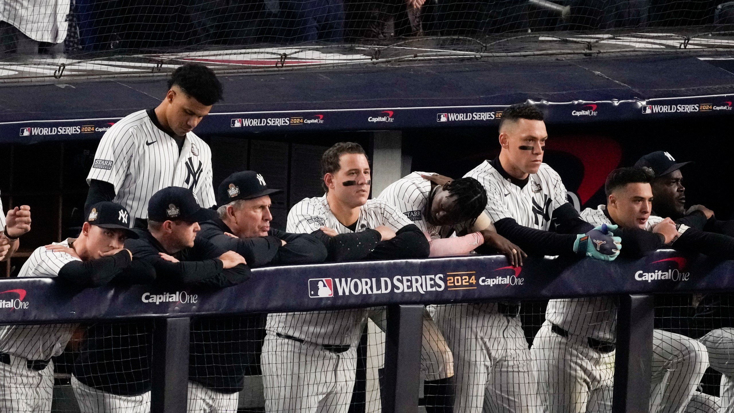 The New York Yankees watch during their loss against the Los Angeles Dodgers in Game 5 of the baseball World Series, Wednesday, Oct. 30, 2024, in New York. (AP Photo/Frank Franklin II)