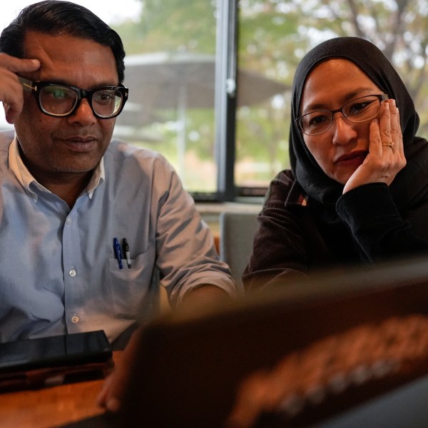 Soraya Burhani, right, works with Georgia Rep. Farooq Mughal, Wednesday, Oct. 30, 2024, in Buford, Ga. (AP Photo/Mike Stewart)